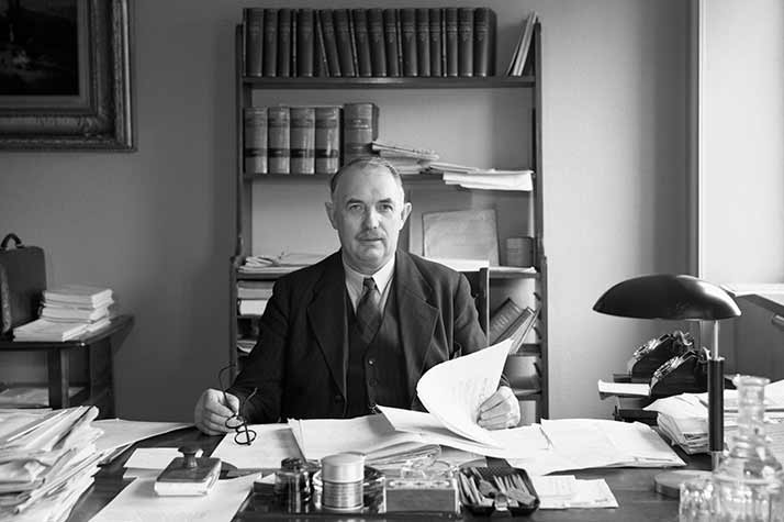 Axel Pehrsson-Bramstorp at a desk in an office room.