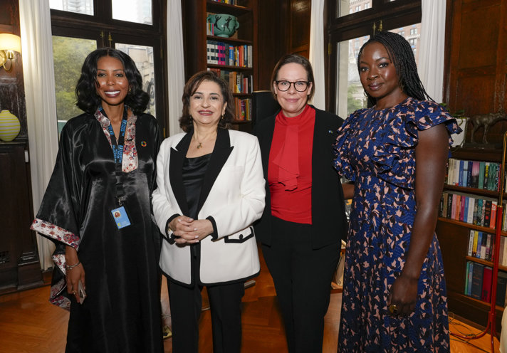 Four women is standing together. From left: Regional UN Women Ambassador Jaha Dukureh, UN Women Executive Director Sima Bahous, Minister for Foreign Affairs Maria Malmer Stenergard and UN Women Goodwill Ambassador Danai Gurira.